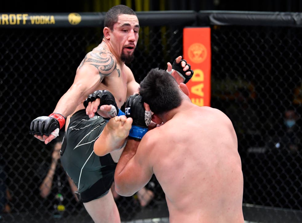 <p>Whittaker in his most recent fight, a points victory over Kelvin Gastelum</p>