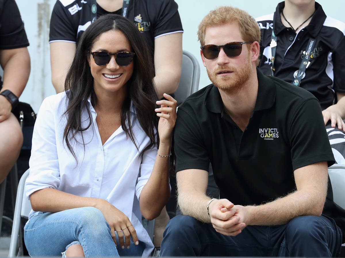 Meghan Markle’s sweet nod to first outing with Prince Harry in Christmas card photo
