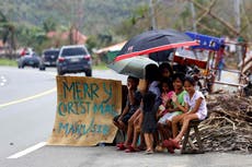 Philippines celebrates subdued Christmas after deadly typhoon