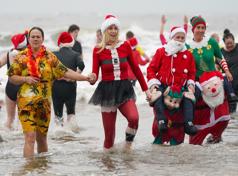 <p>Bathers brave the cold waters of the North Sea as they take part in the annual Boxing Day dip at Redcar Beach on December 26, 2021 in Redcar, England.</p>
