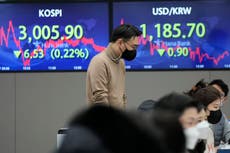 Asian stocks mixed in quiet end of year trading