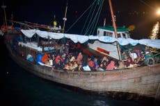 Boat with 120 Rohingya refugees disembarks in Indonesia port