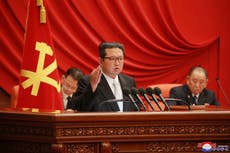 NKorea's Kim vows to boost military, maintain virus curbs