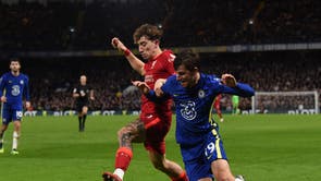 Konastantinos Tsimikas of Liverpool with Chelsea’s Mason Mount during the Premier League match at Stamfrod Bridge