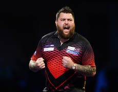 Michael Smith eases past James Wade to reach second World Championship final