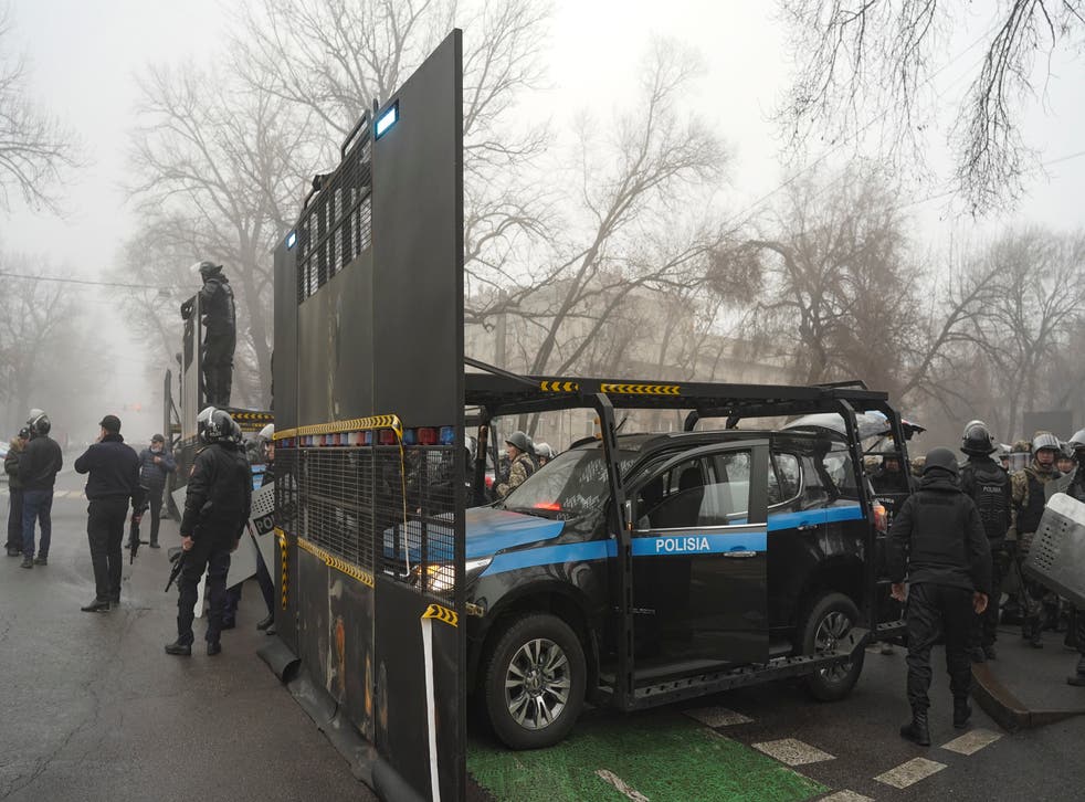<p>Riot police officers prepare for violent skirmishes</p>