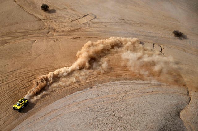 Christian Lavieille and co-driver Johnny Aubert compete during the Stage 6 of the Dakar 2021 near the Saudi capital Riyadh