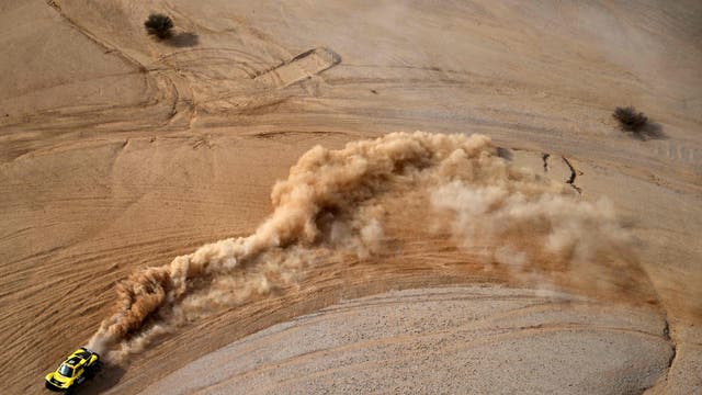 Christian Lavieille and co-driver Johnny Aubert compete during the Stage 6 of the Dakar 2021 near the Saudi capital Riyadh