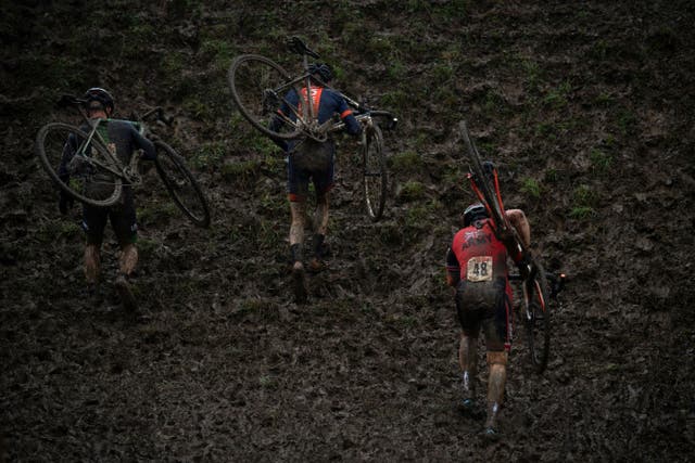 Riders compete during the Veterans Men's race at the UK Cyclo-Cross National Championships 2022 in Ardingly, south of London