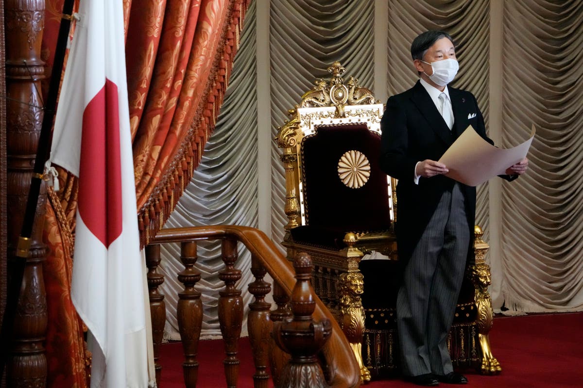 Japan's Kishida says virus measures, defense top priorities