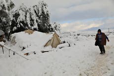 Impoverished Lebanese, Syrians struggle to survive cold