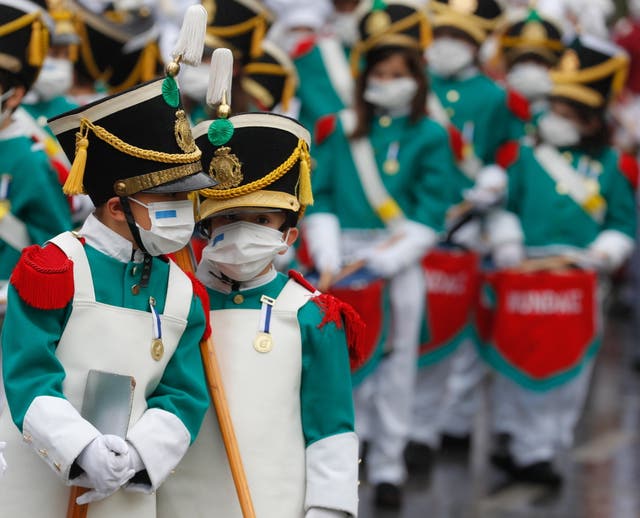 Children wearing traditional uniform take part in the children’s ‘Tamborrada’ drum event to mark San Sebastian patron saint’s Day, in Basque Country, northern Spain