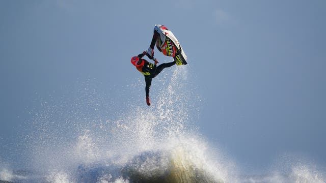 A jet skier jumps the waves off the coast at Blyth in Northumberland