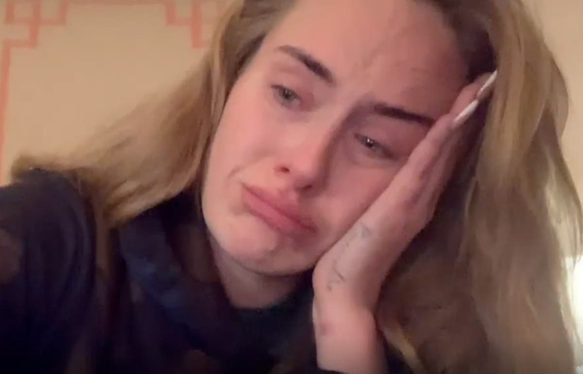 Adele tearfully announces postponement of Las Vegas residency 