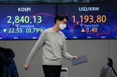 Asiatiske aksjer raser etter flere tap på Wall Street
