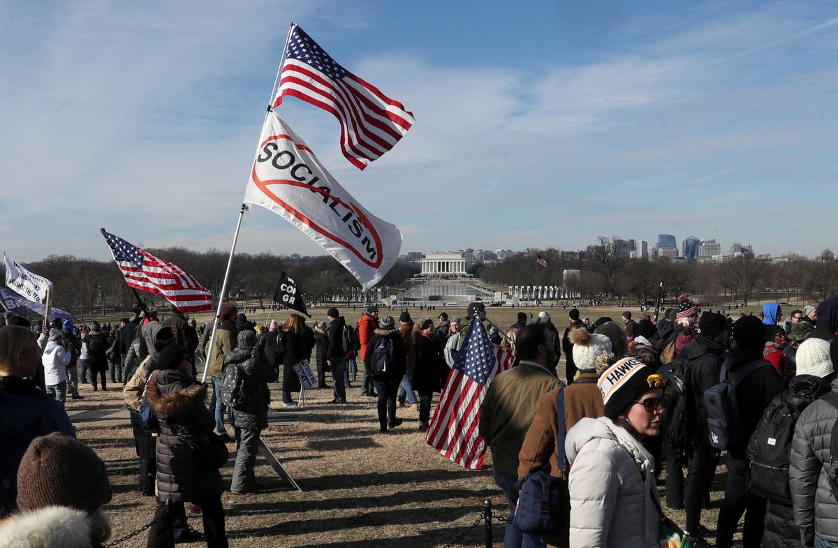 Vaccine mandate opponents gather for march in Washington, DC - live