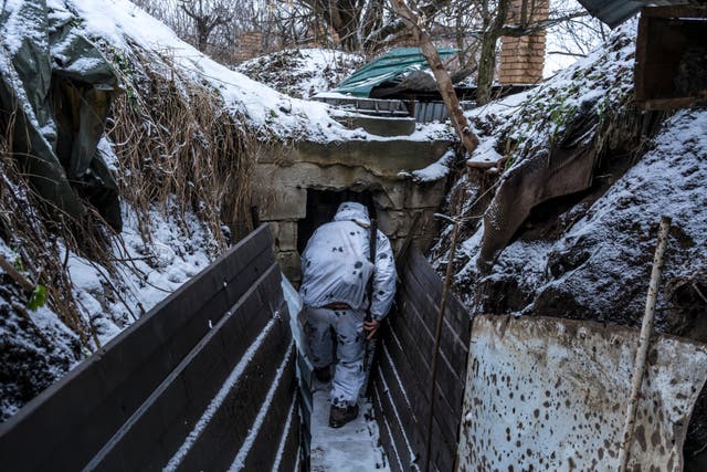 Mykola, a Ukrainian soldier with the 56th Brigade, in a trench on the front line in Pisky, Ukraina