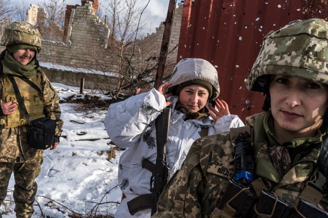 Ira, Katya and Alyona, Ukrainian soldiers with the 56th Brigade, on the front line in Pisky, Ukraine
