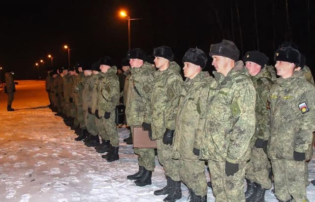 Russian servicemen standing at attention upon their arrival for the joint drills in Belarus
