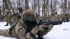 Civilian participants in a Kyiv Territorial Defence unit train on a Saturday in a forest in Kyiv, Ukraine