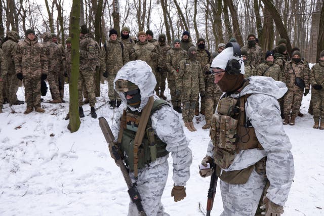 Civilian participants in a Kyiv Territorial Defence unit train on a Saturday in a forest in Kyiv, Ukraina