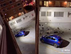 Woman is seen throwing boyfriend’s belongings out of window, sparking debate