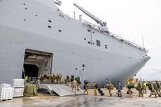 Covid outbreak on crucial Australian aid ship bound for Tsunami-battered Tonga