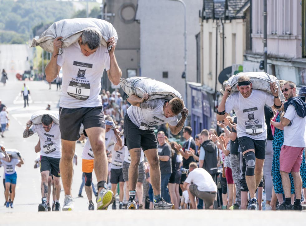 The Scottish Coal Carrying Championships takes place in August (Jane Barlow/PA)