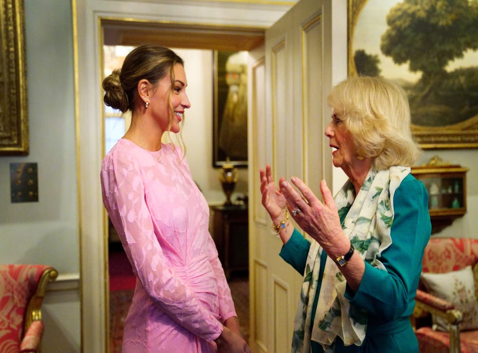 The Duchess of Cornwall talks with Zara McDermott (Victoria Jones/PA)