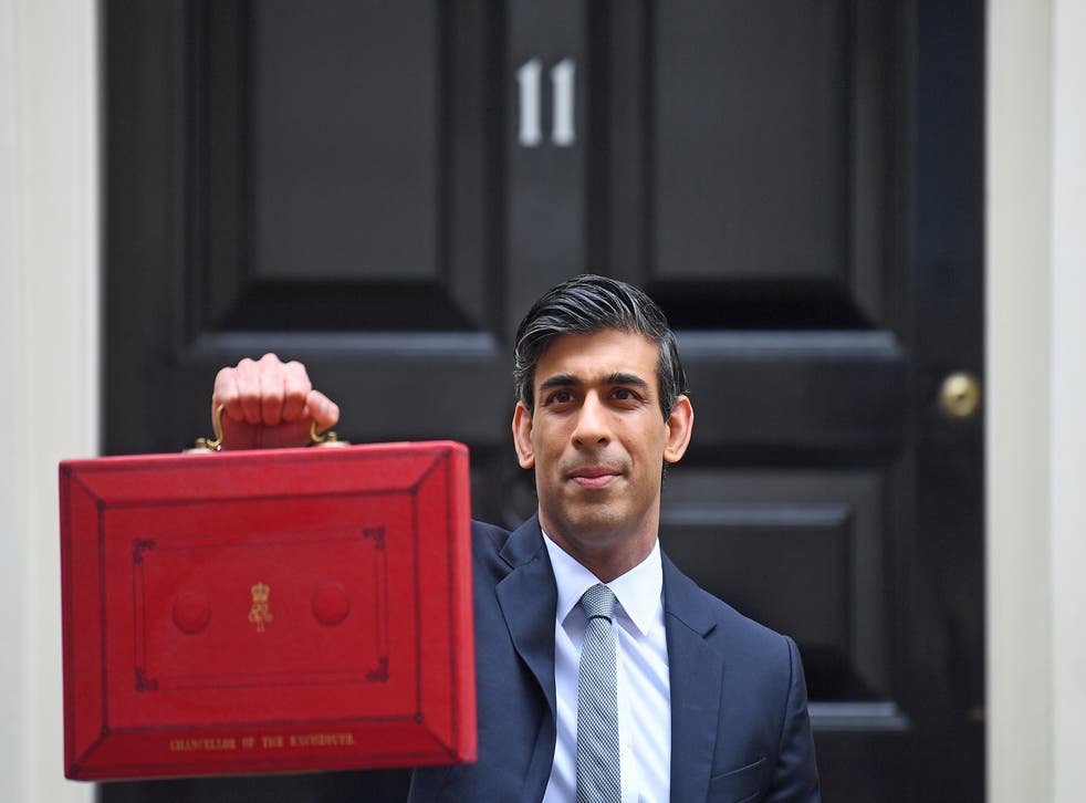 Chancellor of the Exchequer, Rishi Sunak, holds his ministerial ‘Red Box’ (Victoria Jones/AP)