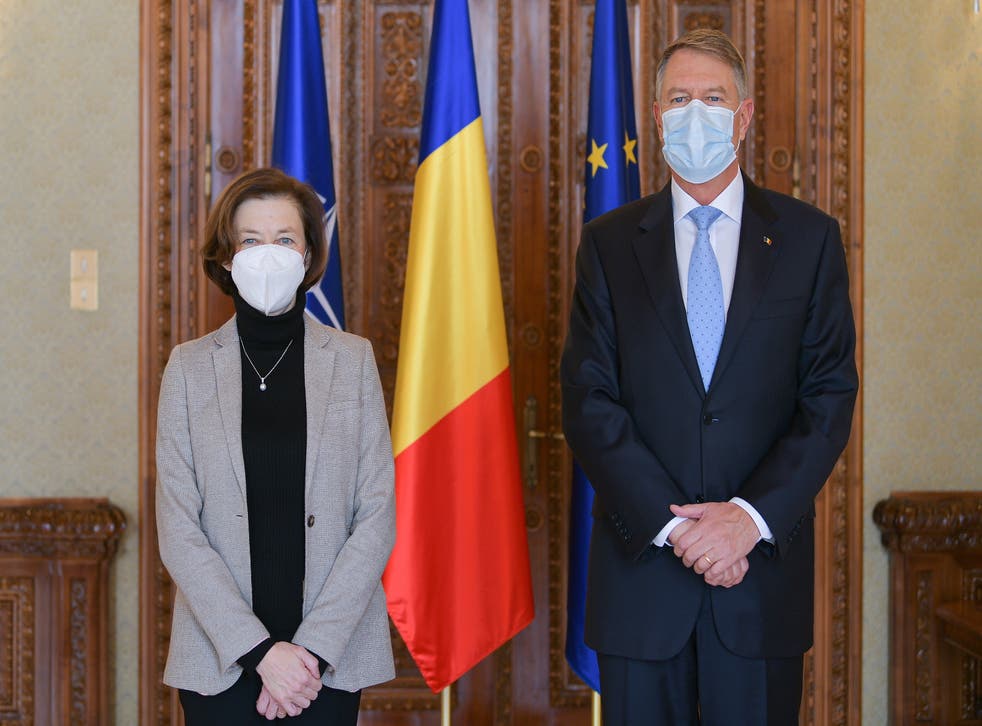 <p>France’s armed forces minister Florence Parly (left) is welcomed by Romanian president Klaus Iohannis (right) in Bucharest</p>