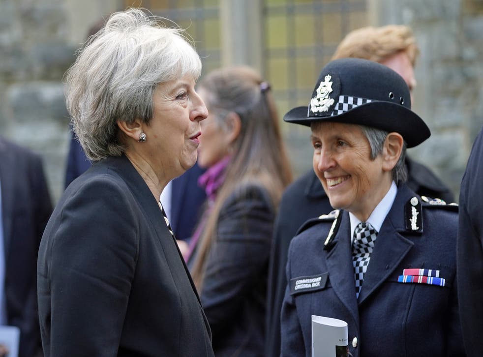 Mrs May speaks to Metropolitan Police Commissioner Cressida Dick (Stefan Rousseau/PA)