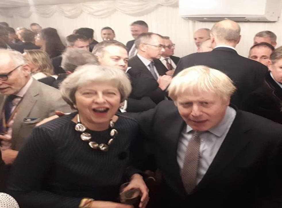 Former prime minister Theresa May with Boris Johnson after he won a huge majority (Eddie Hughes/PA)