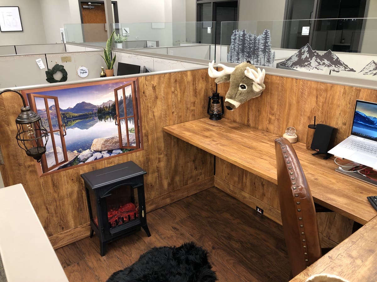 Office worker transforms cubicle into ‘mountain cabin’