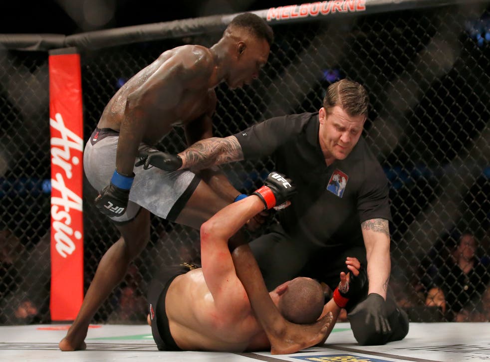 <p>Adesanya forces the stoppage against Whittaker in their first meeting</p>