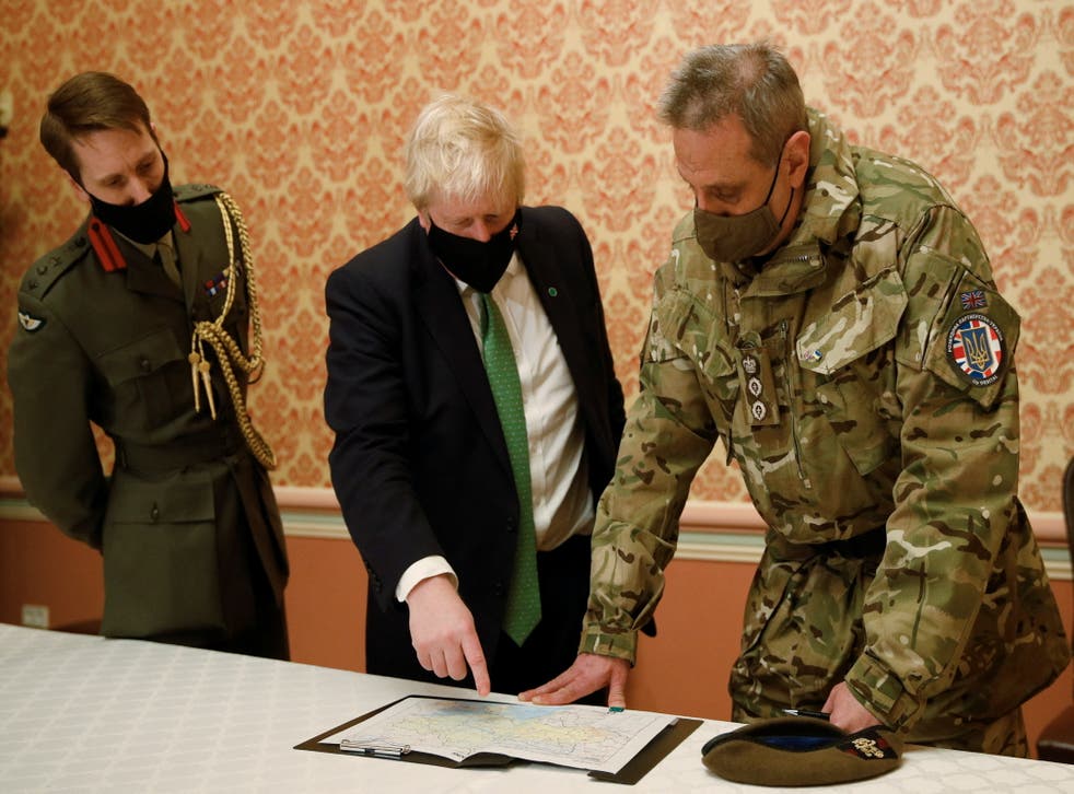 Prime Minister Boris Johnson attends a military briefing with Colonel James HF Thurstan, Commander of Operation Orbital in in Kyiv (Peter Nicholls/PA)
