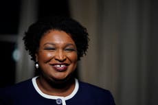 Stacey Abrams blasts ‘political attack’ after slammed for posing maskless at school