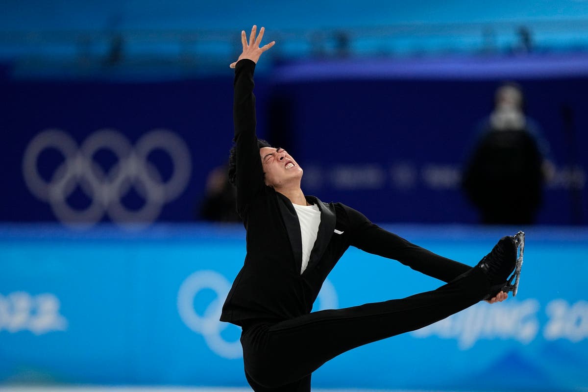 Chen delivers record short program to begin Olympic pursuit