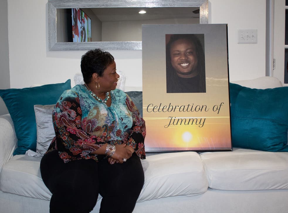 <p>Alfarena McGinty with a picture of her son, Jimmy</p>