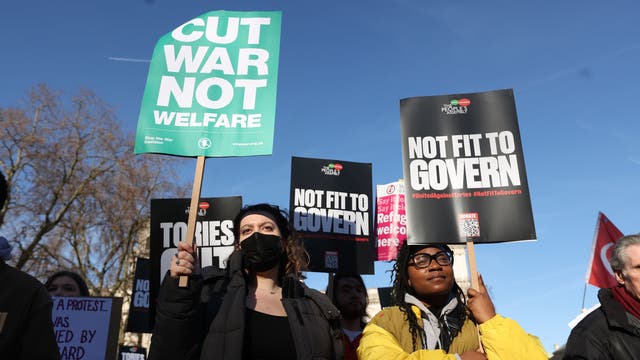 People in Parliament Square, London, take part in the People's Assembly nationwide protest about cost of living crisis