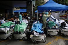 Hong Kong in ‘full-on war mode’ as Covid surge overwhelms hospitals