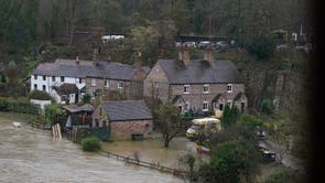 The waters of the River Severn in edge towards homes in Ironbridge, Shropshire, as more wet and windy weather is set to sweep the UK. Storm Franklin is set to strike the UK just days after Storm Eunice destroyed buildings and left 1.4 million homes without power