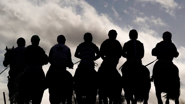 Runners line up for the start of The Anshin Security Conditional Jockeys’ Handicap Hurdle at Taunton Racecourse