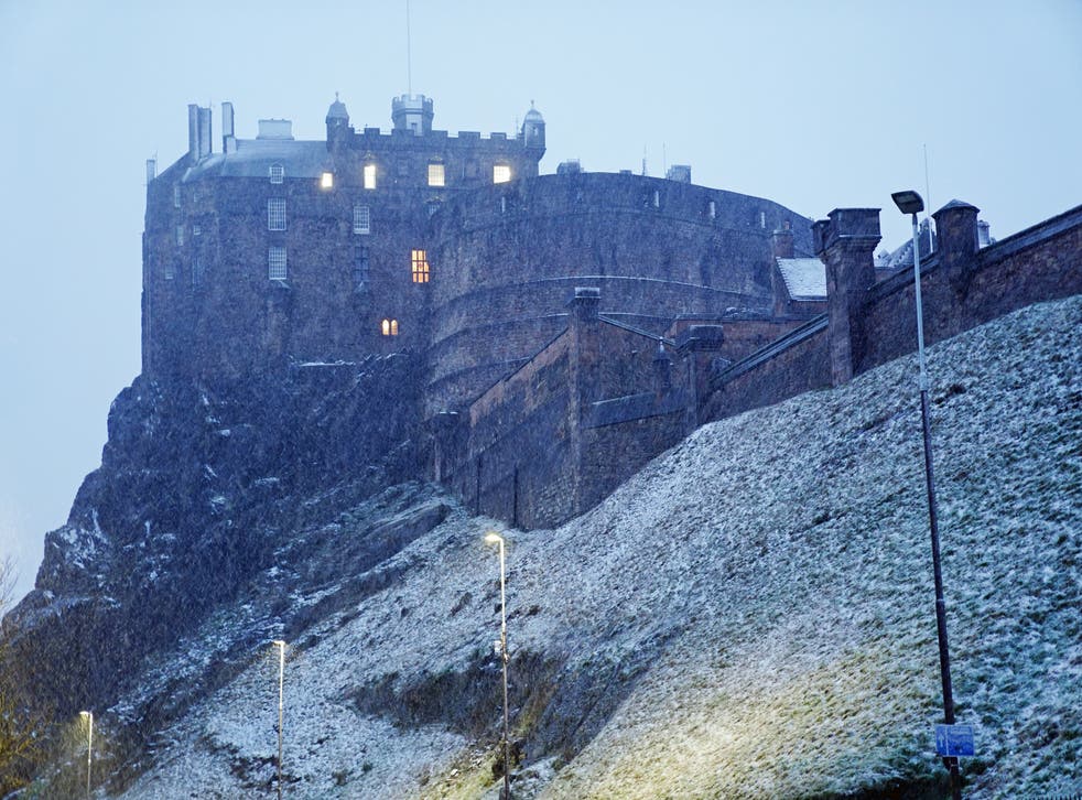 Edinburgh Castle has closed its doors to visitors temporarily due to high winds, with more weather warnings for snow and lightning on the way for Scotland (Jane Barlow/PA)