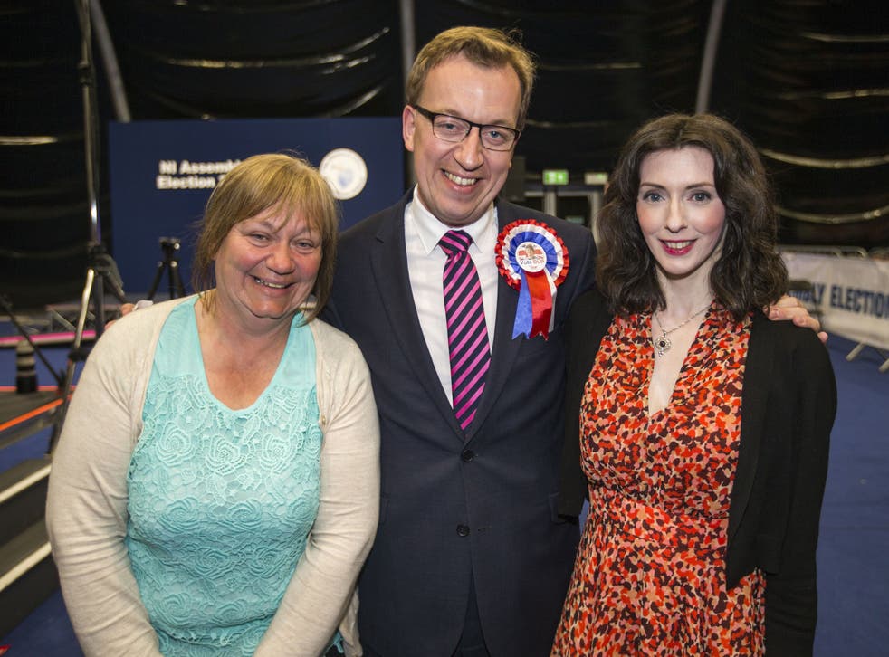 Christopher Stalford with his wife Laura and mother Karen (Liam McBurney/PA)