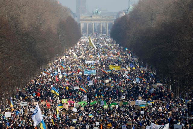 Protesters crowd around the victory column and close to the Brandenburg Gate in Berlin to demonstrate for peace in Ukraine