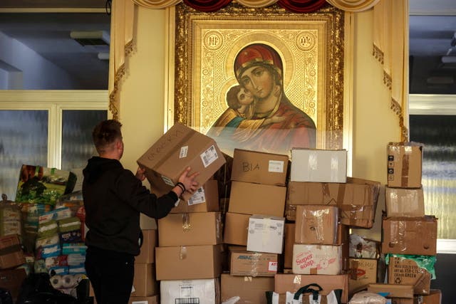 Members of the Ukrainian community of Rome collect basic necessities to be distributed to the Ukrainian population, at the church of Santa Sofia in Rome, Italie