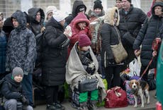 As Ukrainians flee, 'we even feel a bit guilty we are OK'