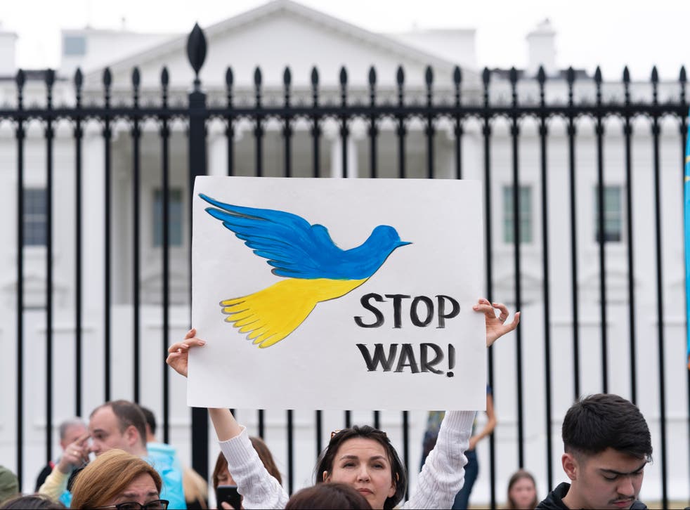 <p>People protesting against the Russian invasion of Ukraine outside the White House in Washington DC on Sunday</p>