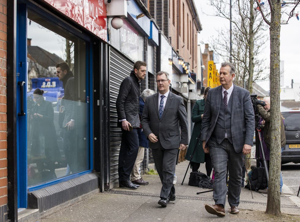 DUP leader Sir Jeffrey Donaldson (left) with his party colleague Edwin Poots MLA at the constituency office of former colleague Christopher Stalford (Liam McBurney/PA)